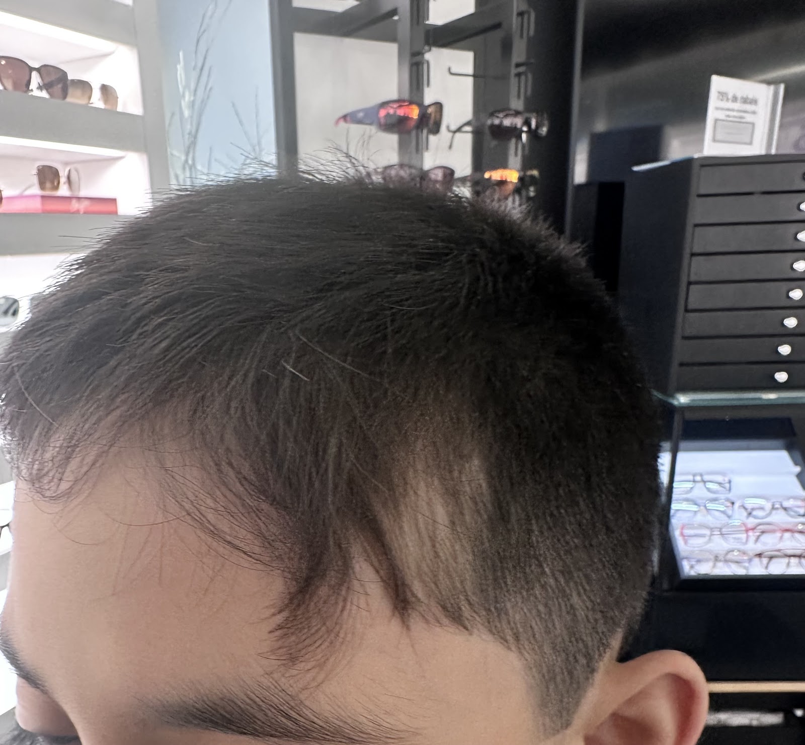 Detail of a clean, sharp haircut at Concept Elite